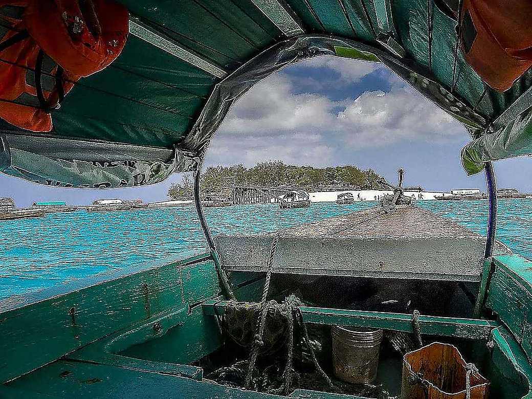 Snorkelling over a turquoise reef in Zanzibar
